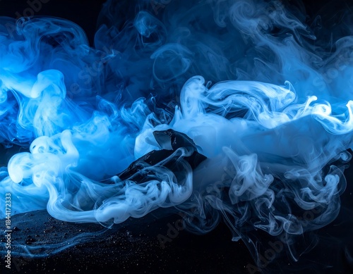 Wallpaper Mural Flowing wisps of blue and white smoke against a dark backdrop Torontodigital.ca