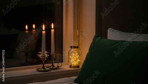 Warm Glow: Candles and Fairy Lights Illuminate a Cozy Bedroom Sc
