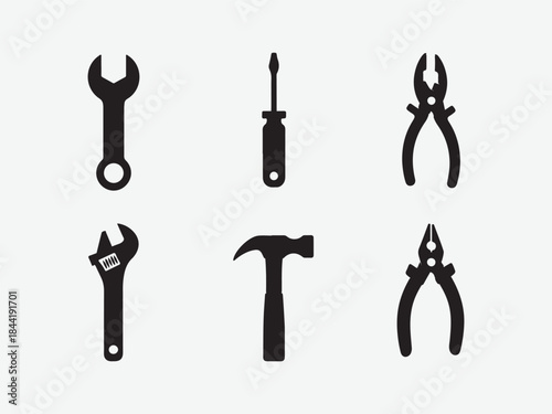 Set of black silhouette icons of hand tools, Collection of silhouetted hand tools including wrenches screwdrivers pliers hammers and saws vector illustration