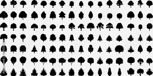 A dense pattern of varied black silhouette trees on a white background
