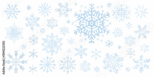 A collection of delicate pale blue snowflakes scattered against a white background