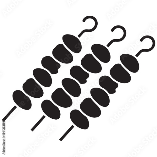 Three black silhouette skewers with meat cubes on white background