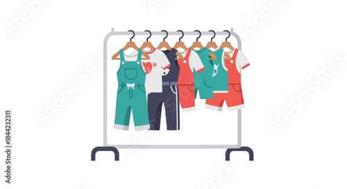 Clothes hang on a rolling rack tees shorts and overalls