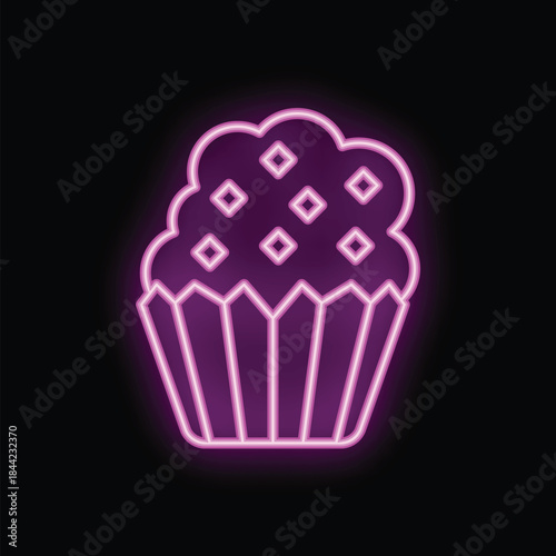 Bright pink neon sign in the shape of a cupcake, with icing and a paper cup