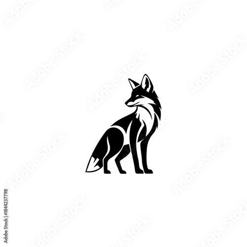Stylish Silhouette of a Fox Sitting Upright with its Tail Curled Around its Body