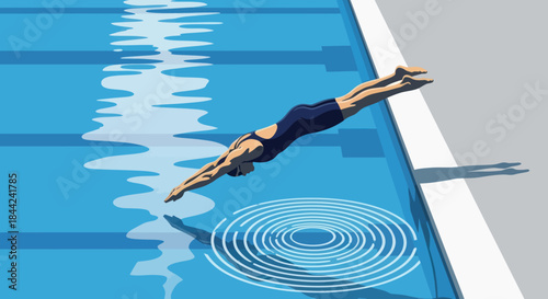 A female swimmer makes a powerful dynamic dive into a clear competition swimming pool.