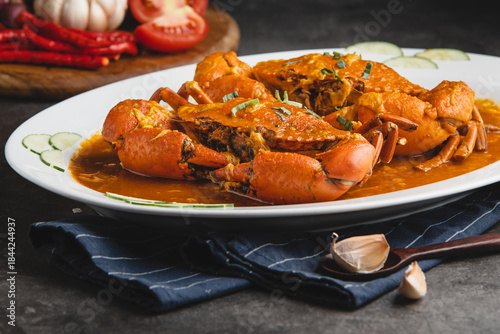Delicious Chili Crabs Served on a White Plate.
