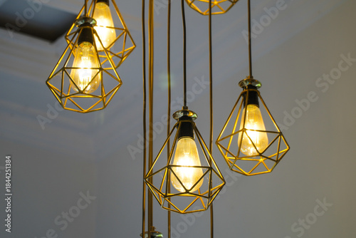 Modern Geometric Pendant Lights with Edison Bulbs Glowing Warmly
