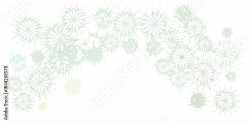 Delicate floral arrangement of pastel colored dandelion seed heads in bloom