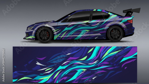 A sports car with a vibrant abstract graphic wrap design featuring blue, purple, and green flowing patterns.