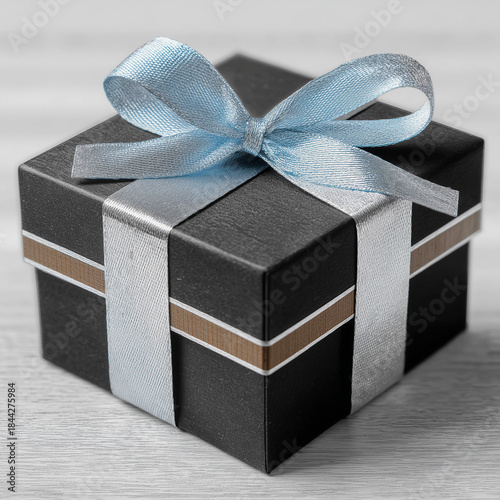 Black gift box with blue ribbon bow