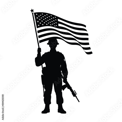 Silhouette of a soldier holding the american flag with pride