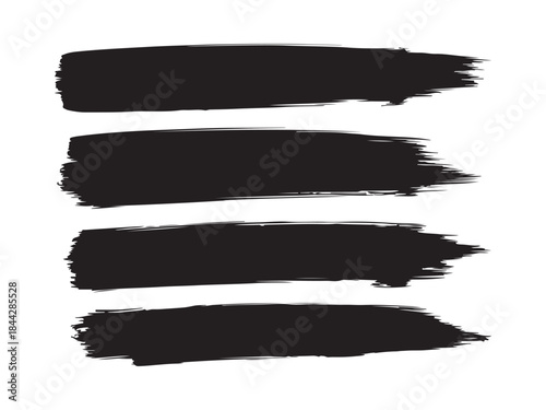 Four black brush strokes for design