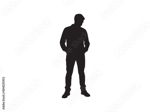 Black silhouette of a man standing with hands in pockets on
