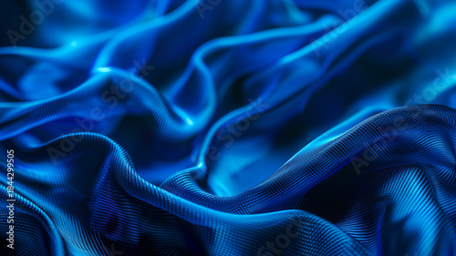 Flowing textured deep blue fabric with subtle light play evokes luxury and softness