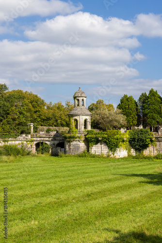 Bilde på lerret Stone folly structure standing in green field Combiers France