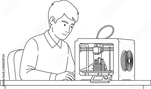 Boy using 3D printer at desk