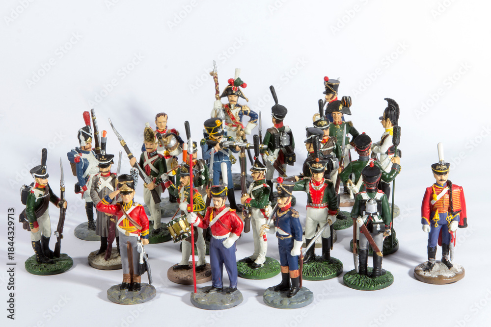 Obraz premium Group of toy soldiers on a plain white