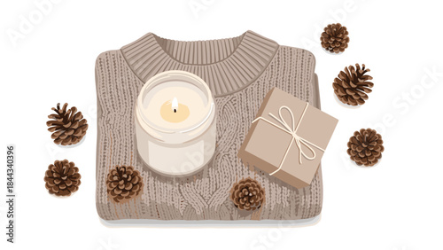Cozy autumn or winter arrangement featuring a warm knitted beige sweater, a lit candle, a small gift, and scattered pine cones.