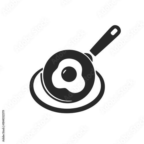 Fried egg in skillet with handle on white background  