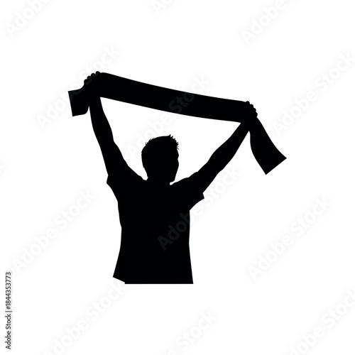 Silhouette of a person holding a scarf above their head.