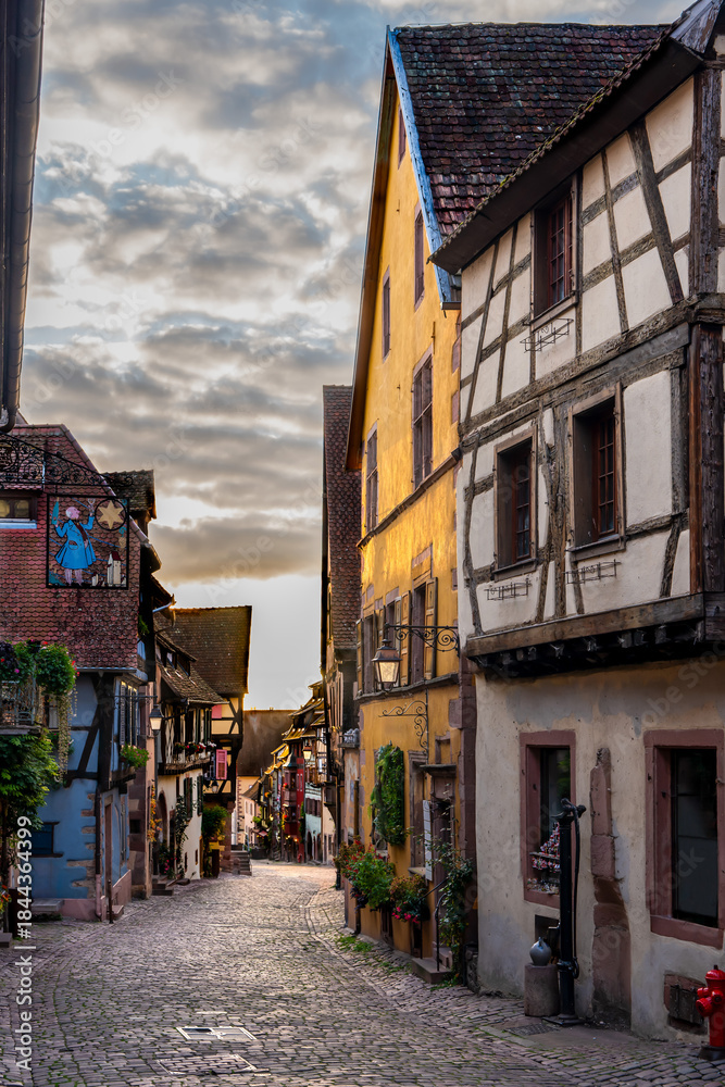 Fototapeta premium France, Alsace, Picturesque half-timbered houses in the historic center of Riquewihr