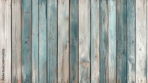Sun bleached wooden planks of a derelict shed weathered with blue and gray tones