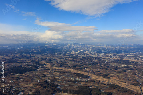 The Hakkoda mountain range and Shichinohe town, lightly covered in snow