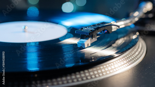 Retro DJ turntable equipment playing old vinyl LP record