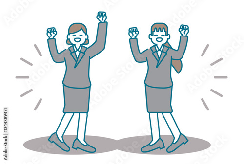 笑顔でガッツポーズをする女性ビジネスパーソン