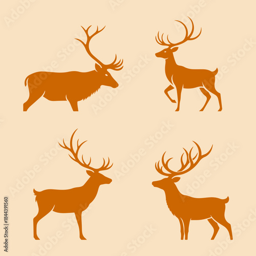 Set of four stylized deer and stag silhouettes in brown color