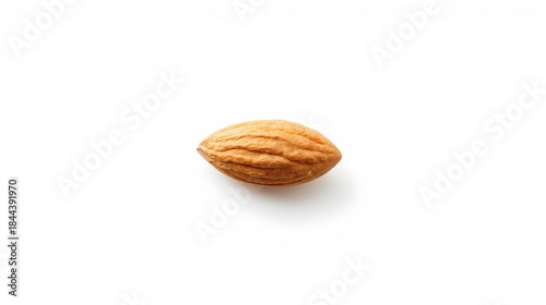 Single almond isolated on pure white background, showcasing detailed texture and natural color