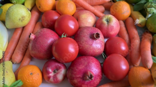 Vibrant flat lay captured in real-time. Emphasizes the variety and freshness of the produce. Perfect for nutritionists and healthy eating campaigns.