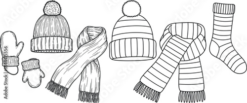 Collection of knitted winter accessories: hats, scarves, mittens, and a sock for cold weather