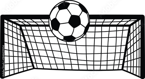 Soccer ball flying into goal net