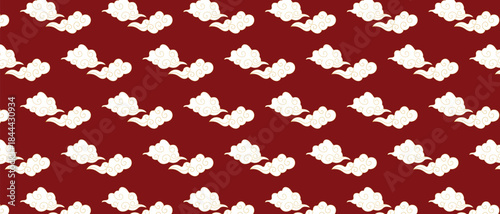 Seamless pattern with traditional Chinese clouds on red background, oriental culture and New Year decorative design