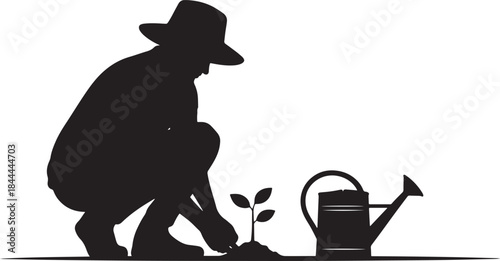 Gardener planting a seedling with watering can silhouette