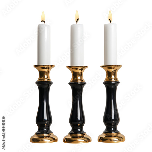 Candle Arrangement With Flame and Modern Holders on Table Surface