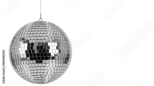 A shiny silver disco ball with small reflective squares hangs against a solid black backdrop