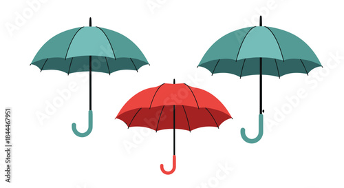 Three colorful umbrellas stand on a white background with two teal canopies and a bright red canopy creating a playful rain shelter mood.