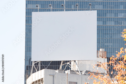 Large blank billboard on a street wall, banners with room to add your own text