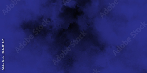 Abstract dark blue watercolor cloudiness, mist, or smog background. Dark navy blue sky with black background and blurred pattern. Vivid textured aquarelle painted art design background.