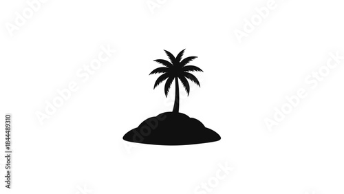Silhouette of a lone palm tree on a small island.