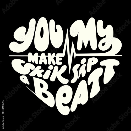 Cream heart shape text with heartbeat line on black