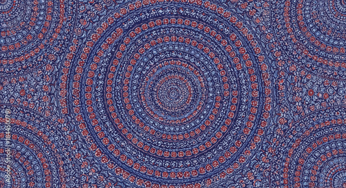 Seamless circular mandala pattern background in shades of blue and red, featuring intricate, concentric, and spiraling floral motifs.