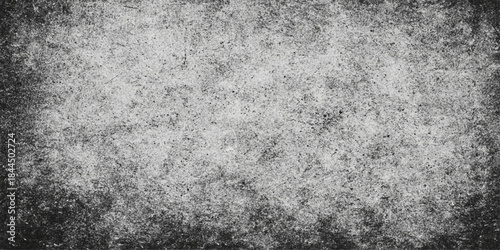 Grungy dark grey concrete wall texture with an aged metal surface and rough vintage stone pattern for a black and white grunge background