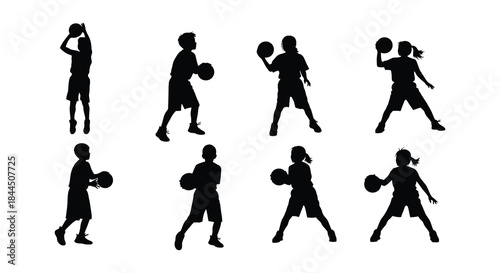 Silhouettes of basketball players in various action poses on a white background