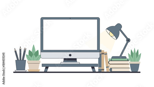 Minimalist workspace with computer monitor, lamp, and plants