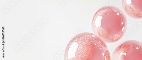 Delicate pink spheres float...