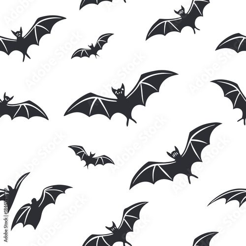 Black bats flying seamless pattern on white background
